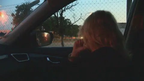 sam in car
