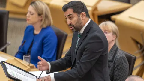 PA Media Humza Yousaf