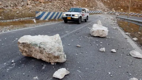 Reuters Rocks are seen on the road after an earthquake near the Darbandikhan Dam, close the city of Sulaimaniyah, Iraq - 13 November 2017