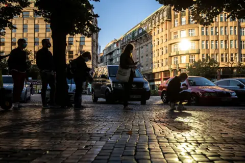 Getty Images Covid vaccination queue in Prague (September 2020)