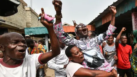 Jubilant supporters of Laurent Gbagbo in Abidjan, Ivory Coast - 31 March 2021
