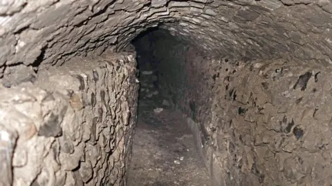 Hyde900 Medieval water channel to distribute water to the abbey buildings
