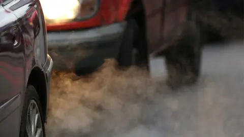 Getty Images Cars emitting fumes