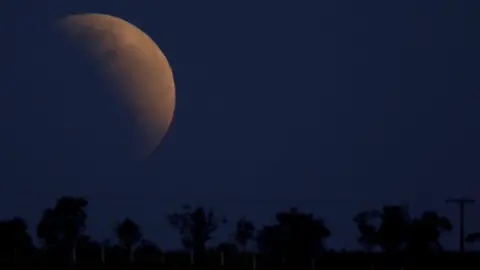 REUTERS/Ueslei Marcelino Lunar eclipse on 16 July 2019 viewed from Brasilia, Brazil