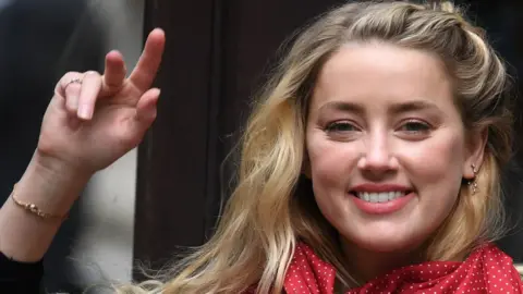 AFP/Getty Images Amber Heard arrives on the 13th day of the libel trial