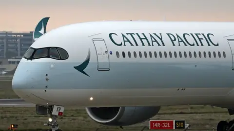 Getty Images Hong Kong's flagship carrier Cathay Pacific on the tarmac