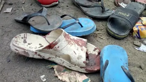 AFP Bloody flip flop at scene of the 16 February attacks in Konduga, Nigeria