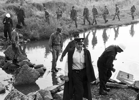 Getty Images Police and soldiers searched nearby bushland and creeks