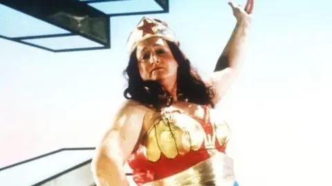 Bella Emberg as Blunderwoman