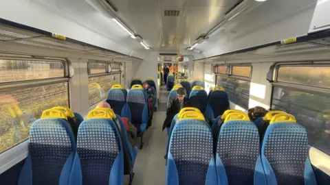 Laura Foster/BBC Inside train