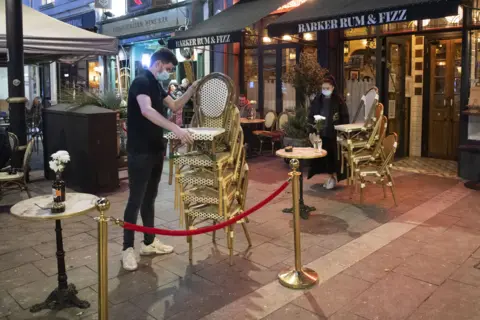 Covid Pub alcohol ban sees barrels of beer poured away