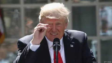 Getty Images This was President Trump on the day he announced the US would be pulling out of the Paris climate agreement
