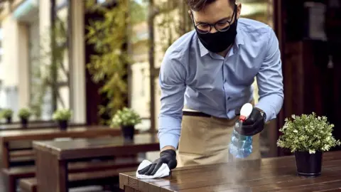 Getty Images A waiter