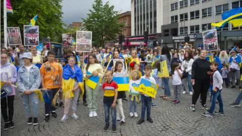 Pacemaker Members of the Ukrainian community held an anti-war rally in Belfast in July