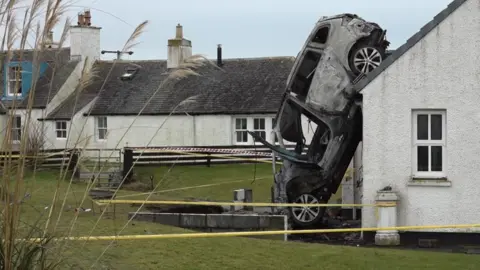 BBC Car crashed at house