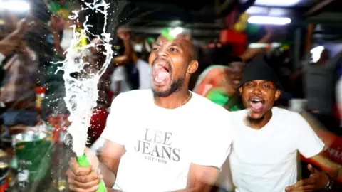 Reuters Fans celebrating