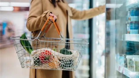 Getty Images Woman shopping