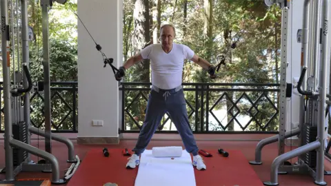 Reuters File photo from 2015 showing Russian President Vladimir Putin lifting weights at a gym at the Bocharov Ruchei state residence in Sochi