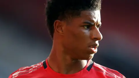 PA Media Marcus Rashford on the pitch