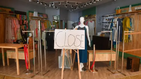 Getty Images A closed sign at a shop