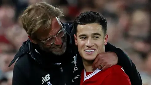 Jurgen Klopp and Philippe Coutinho