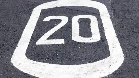 Getty Images 20mph sign painted on road