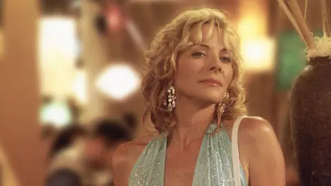 Getty Images Kim Cattrall playing the role of Samantha Jones