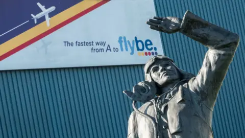 Getty Images Aviator in front of Flybe sign