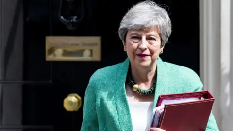 Getty Images Theresa May setting off to the House of Common for Prime Minister's Questions