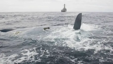 US Navy/Reuters Overturned hull of the Cheeki Rafiki