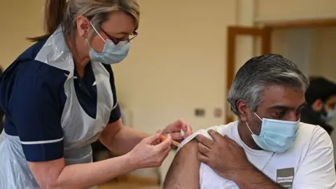 Getty Images Vaccination by a nurse