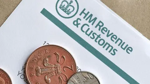 Getty Images Coins and HMRC letter