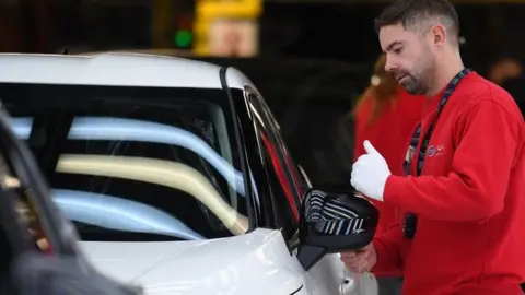 A worker at a Nissan factory in Sunderland, UK