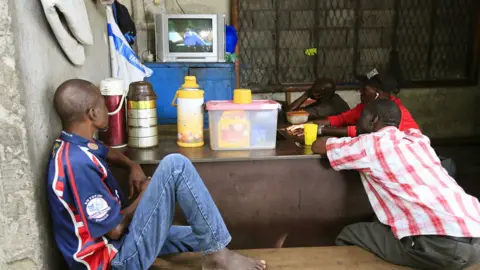 EPA Fans watch a match between Japan and Senegal in Abidjan, Ivory Coast - Sunday 24 June 2018