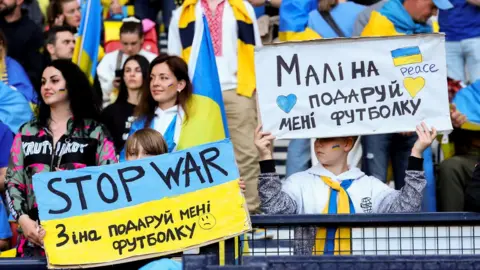 Getty Images Ukrainian fans at a football match