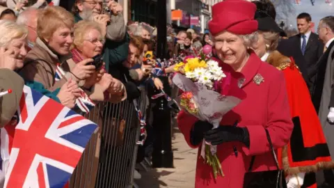 Anwar Hussein Collection/ROTA/WireImage Queen Elizabeth II meets the public during a walkabout in Stafford on March 31, 2006.