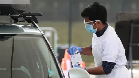 PA Media A man at a drive in test facility