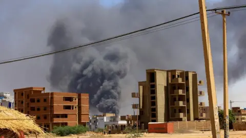 Reuters Smoke rises above a building