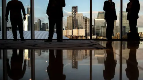 Getty Images shadow businessy figures