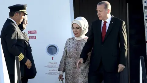 AFP President Erdogan and wife on arrival, 6 Jul 17