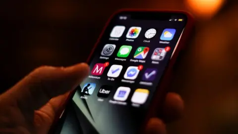 Getty Images Phone showing different apps.