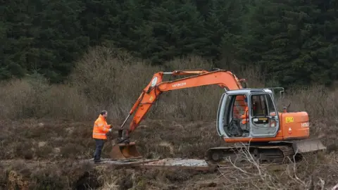 Pacemaker Digger in Bragan Bog searching for Columba McVeigh April 2023