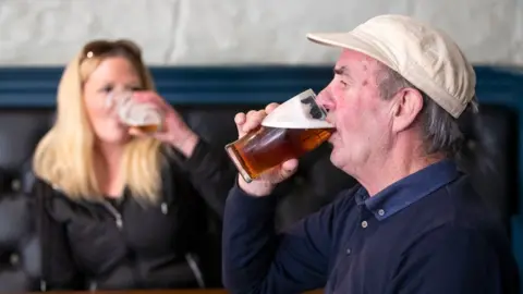 PA Media people in pub