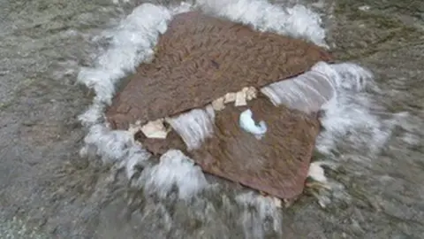 SENS Sewage flooding from manhole