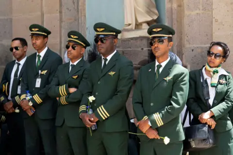 Reuters Ethiopian Airlines crew members attend a memorial service for the victims of the Ethiopian Airlines Flight ET 302 plane crash, at the Selassie Church in Addis Ababa, Ethiopia March 17, 2019