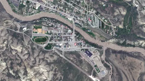 Maxar Technologies/Handout via Reuters Satellite imagery shows the damage around the park's north entrance