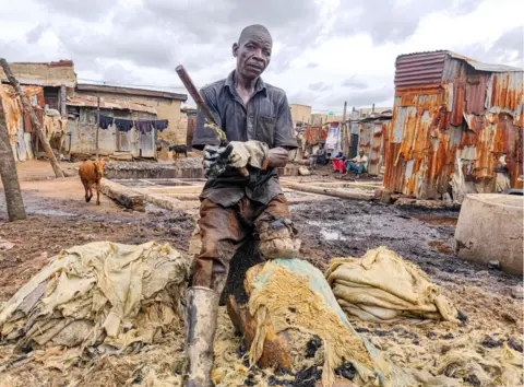 Zulyadain Isa Bello/Getty Images A tannery worker at his workshop in Kano, Nigeria - Sunday 13 August 2023
