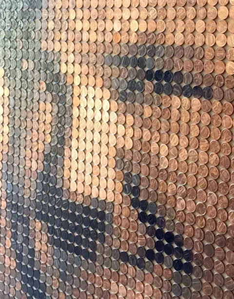 Ed Chapman/PA Coin portrait of Oliver Hardy, which Julian Pickford commissioned his friend, renowned mosaic artist Ed Chapman, to create to mark the forthcoming world premiere of a biopic of comedy legends Laurel and Hardy.