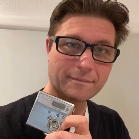 Graeme Patfield Graeme Patfield and his mini disc player