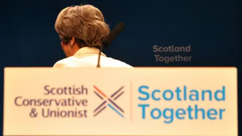 Getty Images Theresa May conference